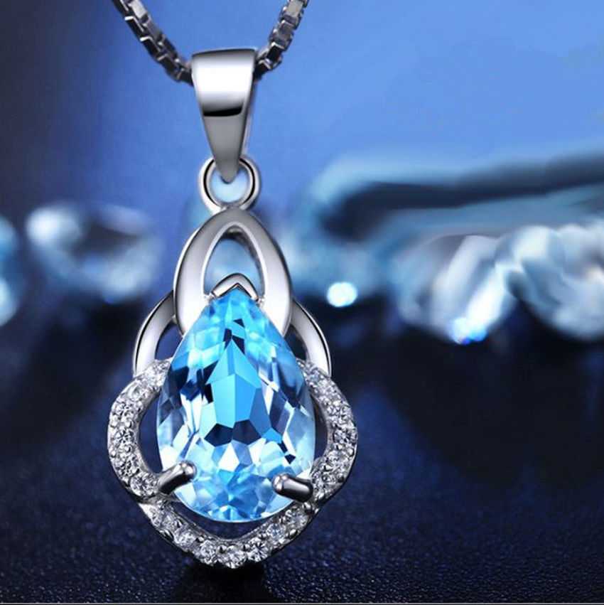 Women's Sterling Silver Topaz Pendant With Cubic Zirconia Stones