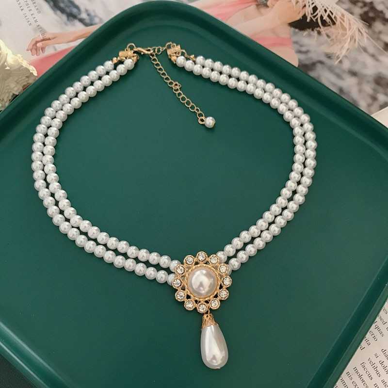 Women's Double Layered Pearl Choker With Pearl Drop Pendant